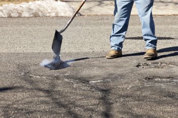 Pothole Filling in Double Oak, Texas by Chip Seal Pros